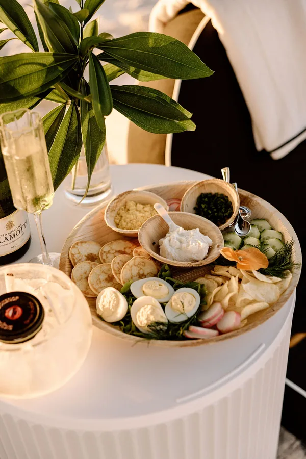Charcuterie board with cheeses and cured meats styled for a Naples beach setup